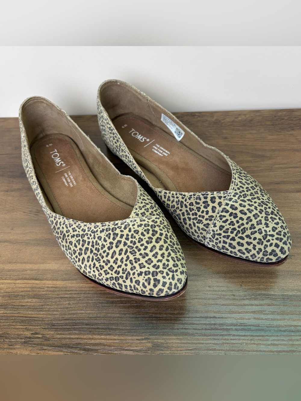 TOMS Leopard Print Slip-On Flats in Beige and Black